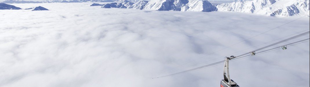 Den Wolken entschweben und einen herrlichen Skitag auf dem Schnalstaler Gletscher genießen.