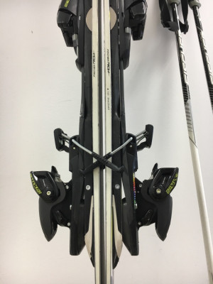 Not like this! Skis shouldn't be stored in one another, since this puts permanent tension on the bindings.