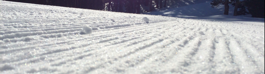 Artificial snow is used at the base so the runs are also perfectly groomed.