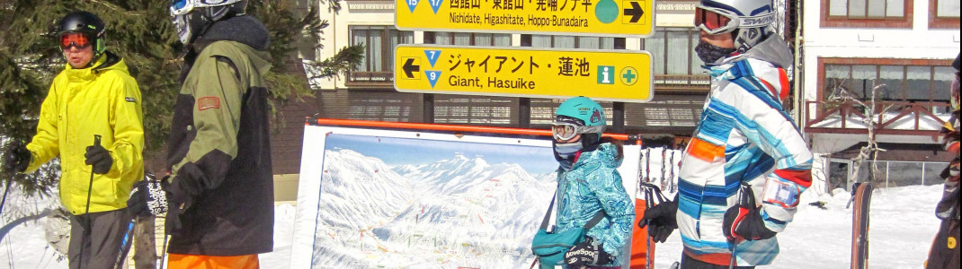 Signage and piste map in the valley