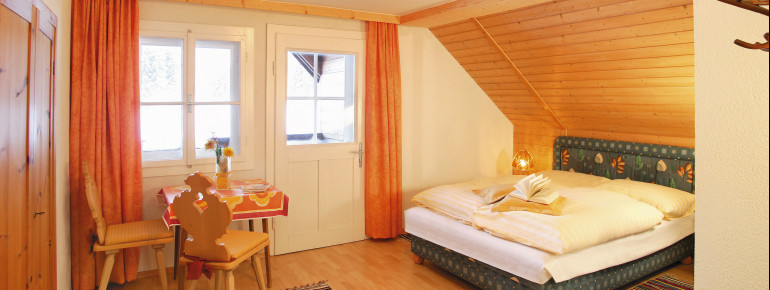 Schlafzimmer in den Hütten