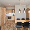 Apartement - Alpenwohnen.L - Muster Wohn-Essbereich