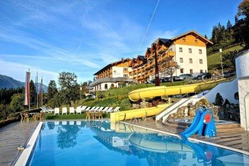 Hotel Glocknerhof - Schwimmbad mit Wasserrutsche in Kärnten