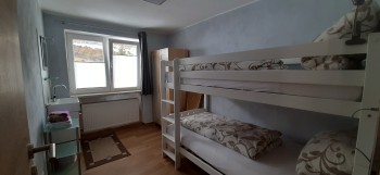 Zweibettzimmer mit Stockbett in FeWo