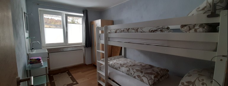 Zweibettzimmer mit Stockbett in FeWo