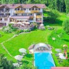 Gartenhotel Rosenhof bei Kitzbühel - Hotel mit Pool und Garten