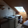 Küche der Ferienwohnung mit Balkon