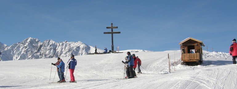 Beim Gipfelkreuz am Rangger Köpfl