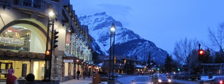 Banff Avenue at dawn - as soon as the stars come out, everyone's hanging out inside the bars, pubs, and clubs.