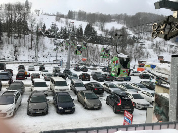 A large car park (free of charge) is located right at the gondola's base station.
