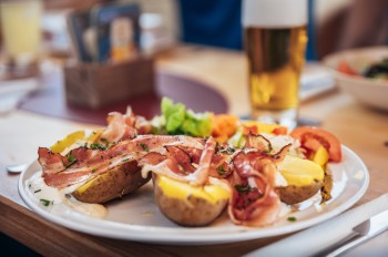 Hearty oven-baked potatoes are served at the Hochwurzenhütte.