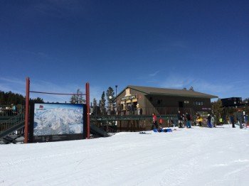 The sun deck at The Outpost at the base station of Chair 13.