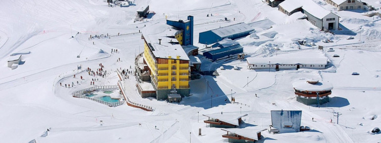 One of the most famous views of the resort: the bright yellow Hotel Portillo.