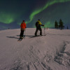 In Finnish Lapland, the green glowing northern lights shine.