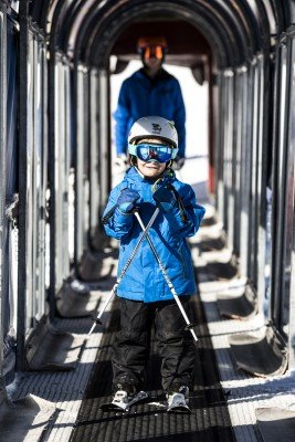 The magic carpet lifts at the BIG Family Ski Camp have weather protection tunnels