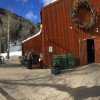 Spot the Oak Street Lift behind Telluride Station and its Visitor Information Center.
